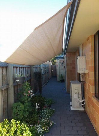 Get some shade down the side of you house with one of our Shady Lady Shade Sails. Size 1.5x5m in Sand. Thanks Dave. He says "My Azalia's are loving the extra shade and come winter I can take it down.........."\\n\\n10/02/2018 9:58 AM